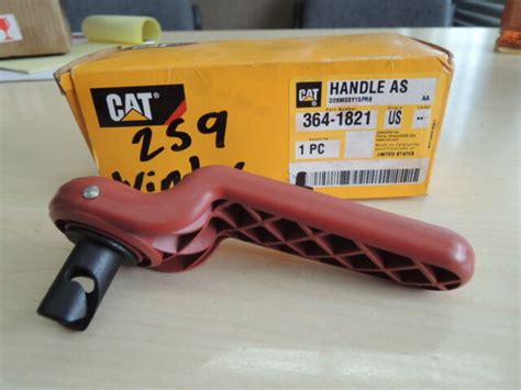 cat 259d emergency door release handles